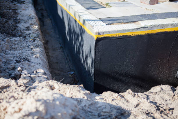 Professional Waterproofing technician working in Menominee, MI